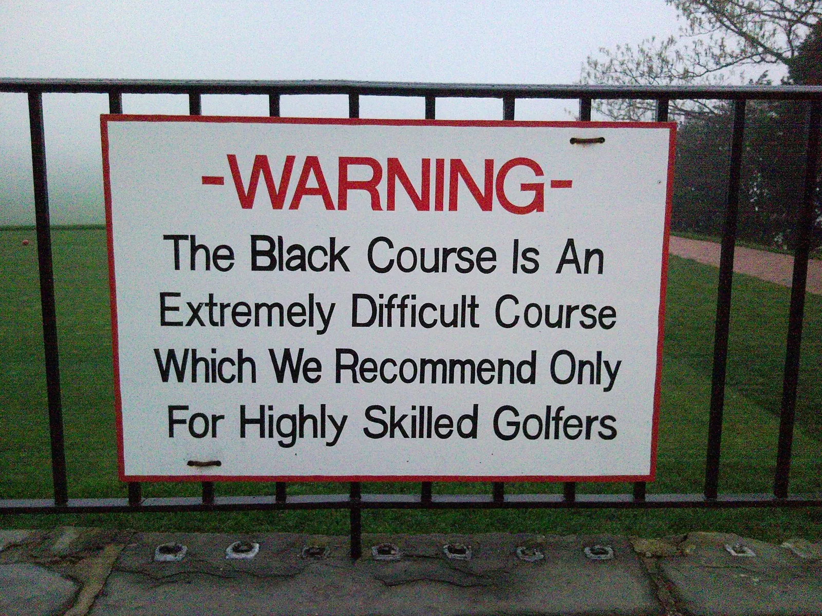 The famous warning sign at the first tee of Bethpage Black