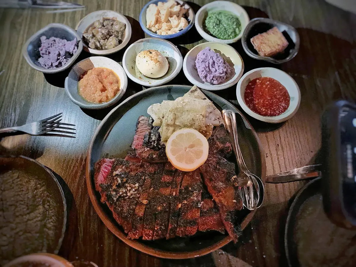 A sliced dry-aged porterhouse steak