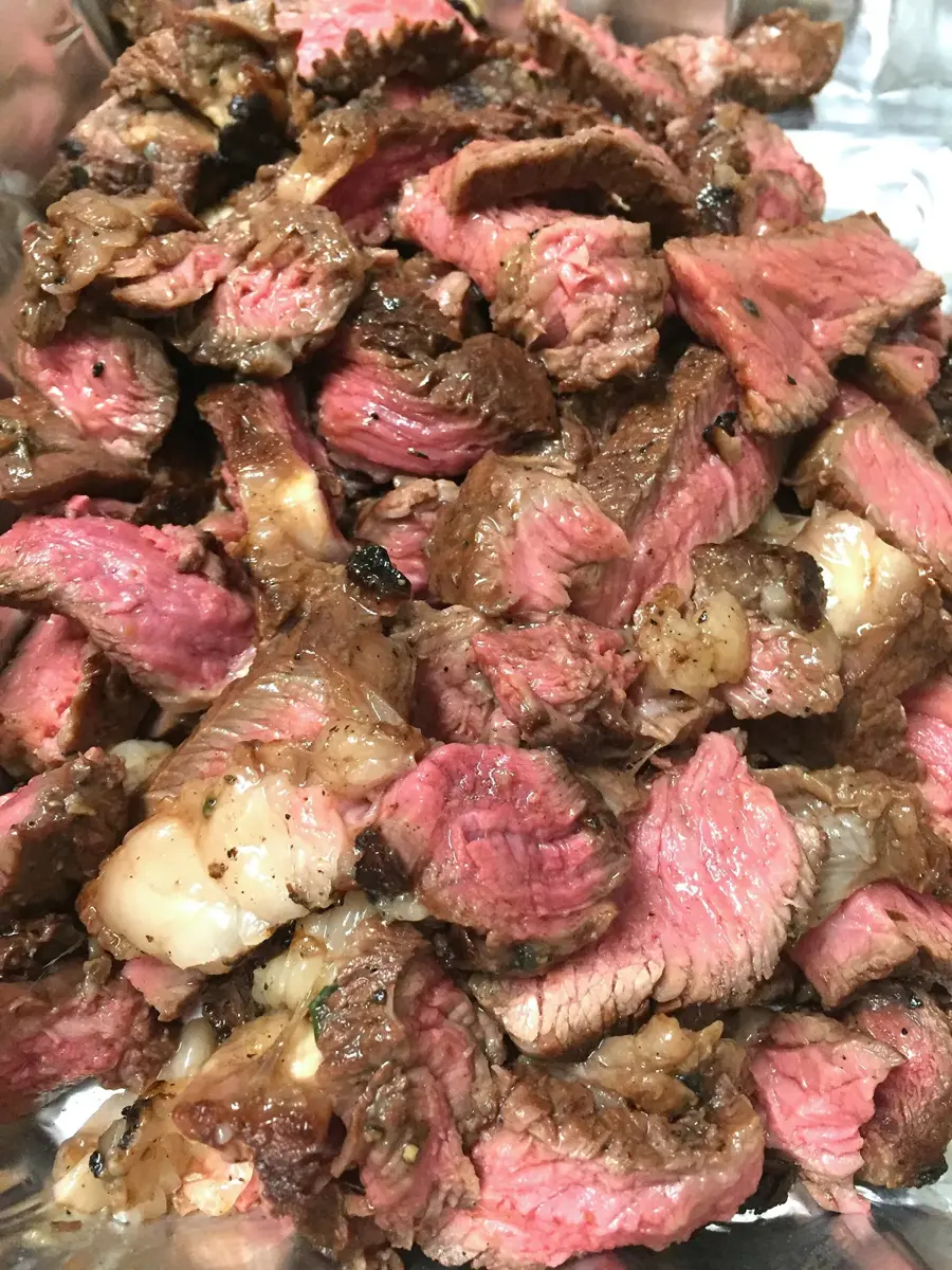 A grilled ribeye steak just off the grill