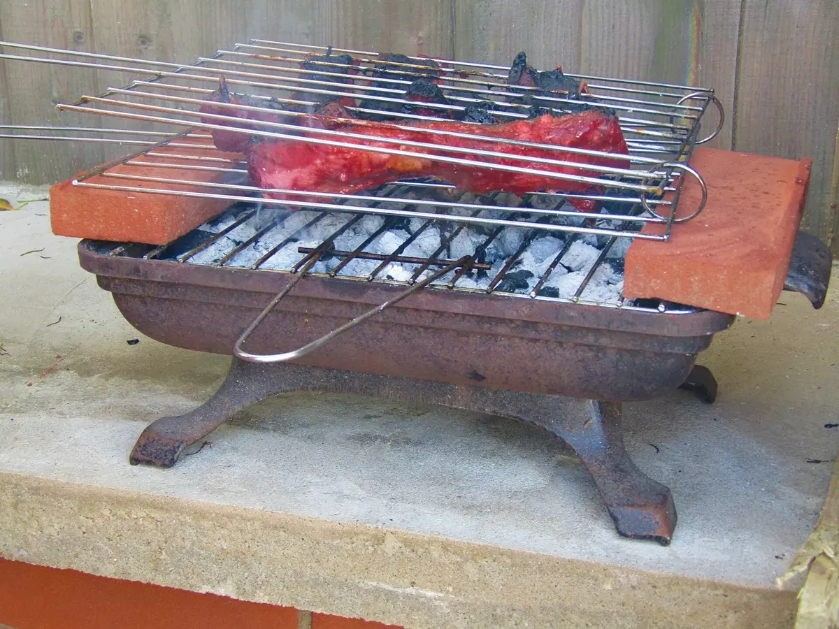 Barbecued pork spare ribs on a grill