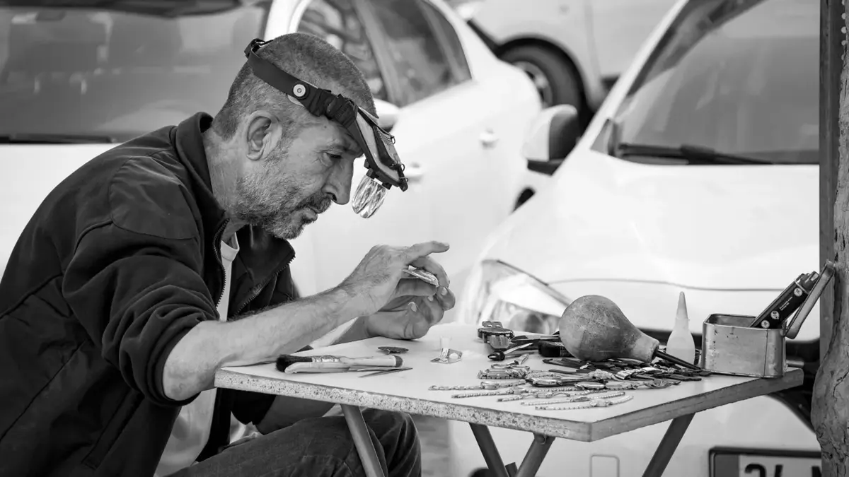 A watchmaker working at the bench
